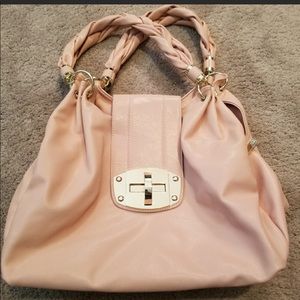Charming Charlie’s three pocket handbag